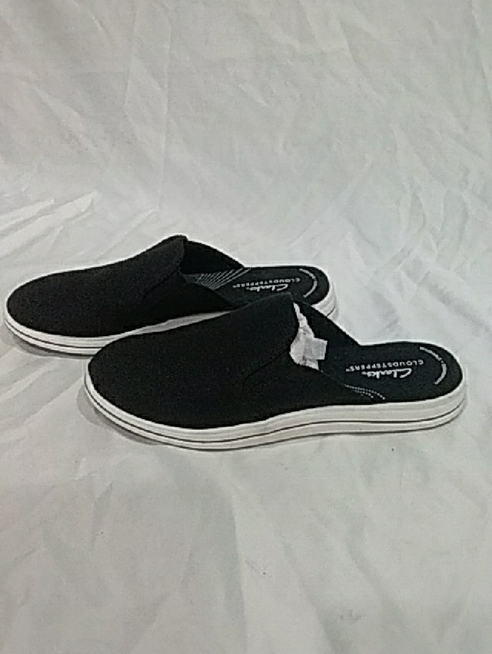 Clarks Black Slip-On Sandal with Brown Sole